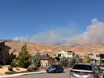 Smoke rises during wildfire in Reno, Nevada, U.S., in this picture taken from social media. 