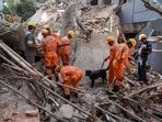 Rescue personnel conduct rescue operations after a multi-storey under-construction building collapsed, at Gachibowli, in Hyderabad, (PTI)