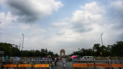 Gram it: Dark clouds hovered over the India Gate at Kartavya Path as Delhi witnessed rain on Sunday, after a long gap. The India Meteorological Department (IMD) has issued a forecast for pleasant weather with light rain and a cloudy sky today as well. (Photo: ANI)