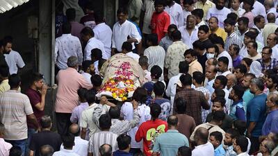 Relatives and friends gather at Chandanwadi Crematorium for the funeral of Sanket Nevashe, president of the Bhuleshwar Cha Raja Ganpati Mandal, who was among the two people killed after the 22-foot Ganpati idol collapsed. (Photo by Anshuman Poyrekar/Hindustan Times) (Anshuman Poyrekar/HT Photo)