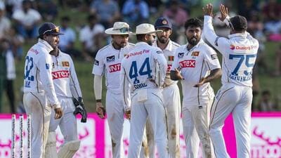 Sri Lanka's Asitha Fernando celebrates with teammates after taking the wicket of Ravindra Jadeja. (PTI) Sri Lanka's Asitha Fernando celebrates with teammates after taking the wicket of Ravindra Jadeja. (PTI)