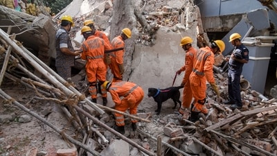 Rescue personnel conduct rescue operations after a multi-storey under-construction building collapsed, at Gachibowli, in Hyderabad, (PTI) Rescue personnel conduct rescue operations after a multi-storey under-construction building collapsed, at Gachibowli, in Hyderabad, (PTI)