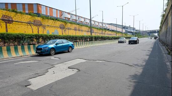 A CRRI team conducted an on-site technical inspection last week, assessing the adhesion and bonding condition of the mastic asphalt with the underpass surface, (Sunil Ghosh/HT Photo)