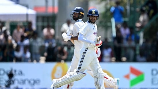 India's captain Shubman Gill (R) and teammate Devdutt Padikkal run between the wickets during the first day of the second Test cricket match