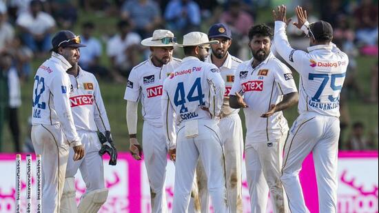 Sri Lanka's Asitha Fernando celebrates with teammates after taking the wicket of Ravindra Jadeja. (PTI)