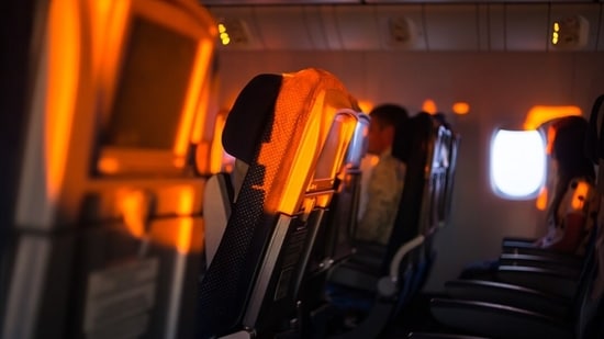 Laptop catches fire mid-flight, leaving five passengers with burn injuries on an American Airlines Plane.