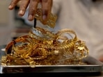 Gold at a store as prices remain elevated across major Indian cities(REUTERS)