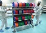 This photograph taken on July 9, 2026 shows staff pushing a trolley of optical fibres at Sterlite Technologies Limited (STL) manufacturing facility in Maharashtra's Chhatrapati Sambhaji Nagar.