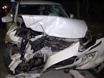  A view of the damaged out-of-control car after it crashed through the divider, in front of the old Police Headquarters, at the ITO traffic signal, in New Delhi on Sunday. 