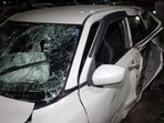 A view of the damaged out-of-control car after it crashed through the divider, in front of the old Police Headquarters, at the ITO traffic signal, in New Delhi on Sunday. (ANI Video Grab)(ANI Video Grab)