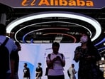 Alibaba raised $10.2 billion for AI infrastructure as its stock fell 8.5%. Chairman Joseph Tsai and CEO Eddie Wu bought shares after the slump.