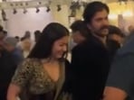 Rashmika Mandanna and Vijay Deverakonda twinned in black and held hands.