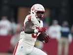 The Arizona Cardinals announced Monday that they have released running back Trey Benson.(AP)