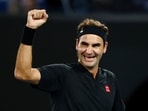 Former tennis player Roger Federer reacts during the exhibition match