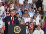 The US unveils new Iran sanctions as Trump says Iran is collapsing.