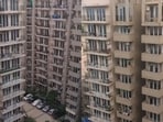 A woman reflected on city life and wondered if high-rise living was worth leaving behind the comfort of one’s hometown. 