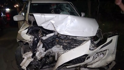 A view of the damaged out-of-control car after it crashed through the divider, in front of the old Police Headquarters, at the ITO traffic signal, in New Delhi on Sunday. (ANI Video Grab)