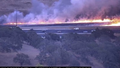 Fire crews stopped the forward spread of the Petaluma Fire in Sonoma County after the vegetation blaze moved into a solar facility (X | Cal Fire LNU)