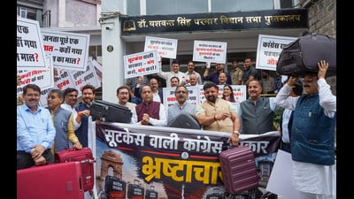 Himachal Pradesh LoP Jai Ram Thakur and others stage a protest against the opposition during the monsoon session of the Himachal Pradesh Assembly, in Shimla on Monday. (ANI) Himachal Pradesh LoP Jai Ram Thakur and others stage a protest against the opposition during the monsoon session of the Himachal Pradesh Assembly, in Shimla on Monday. (ANI)