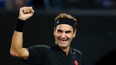 Former tennis player Roger Federer reacts during the exhibition match (REUTERS)