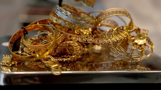 Gold at a store as prices remain elevated across major Indian cities