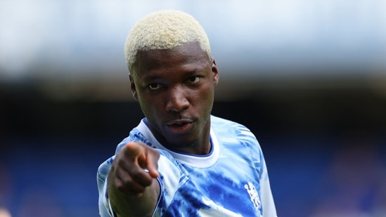 Chelsea's Ecuadorian midfielder #25 Moises Caicedo warms up ahead of the pre-season friendly football match between Chelsea and Real Sociedad at Stamford Bridge in London. (AFP)