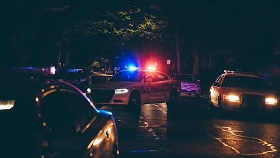 CCTV footage secured by CBS News depicted two individuals involved in a physical scuffle along the road, immediately followed by a sudden flash indicating a gun discharge.(Unsplash/ Representative)