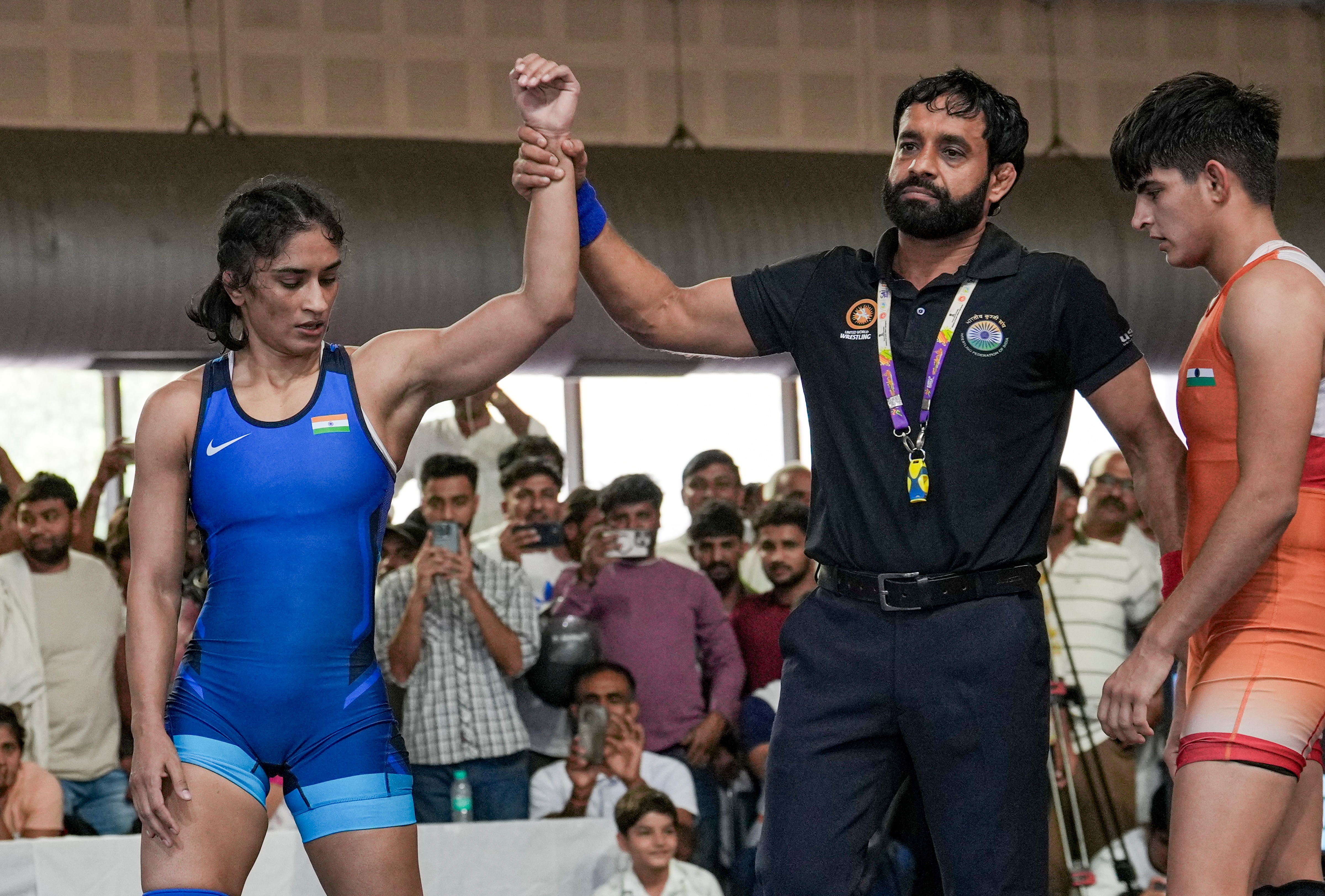 Vinesh Phogat's (in blue) quote highlights her fighting spirit. (PTI)