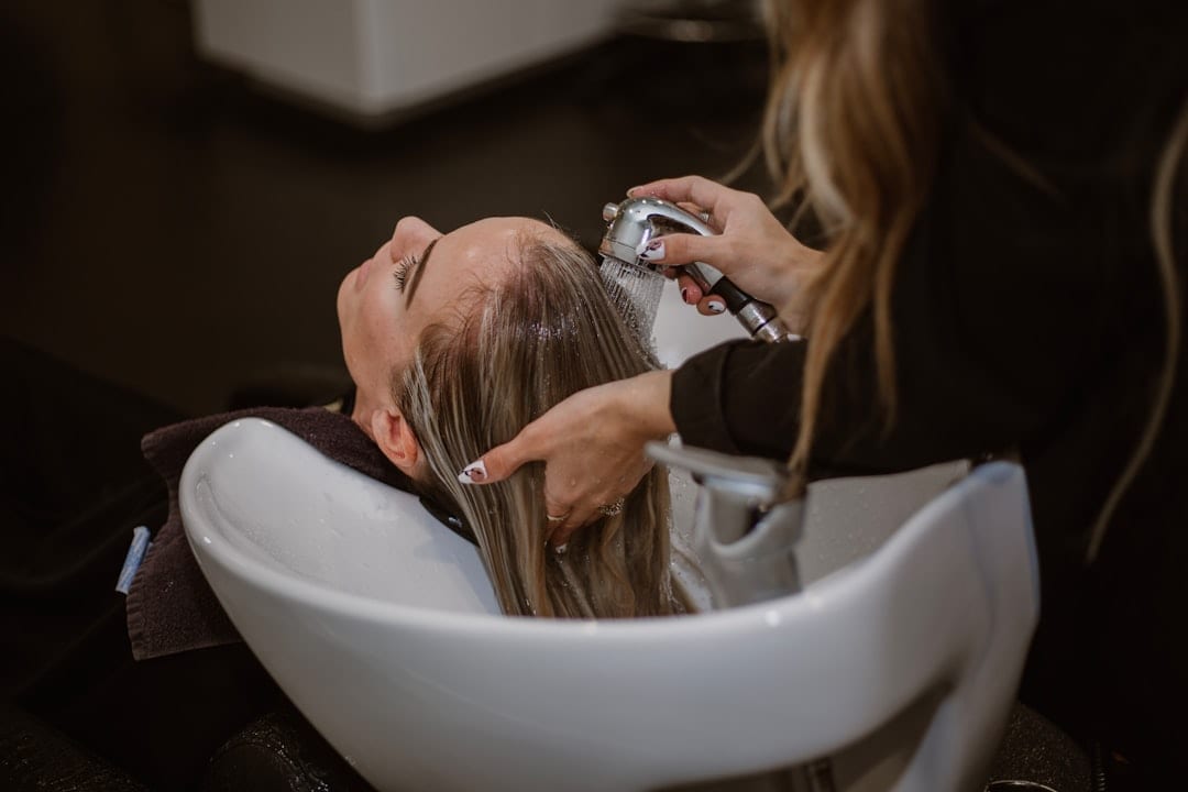 Scalp cleaning and regulation ensure the provision of a more favorable environment for hair growth. (Unsplash)