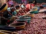 Workers sort onions at the cold storage facility of Bajrang Ice Factory & Cold Storage in Sector-18, Vashi, Navi Mumbai.