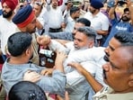 The ruckus during the General House meeting of municipal corporation in Ludhiana on Tuesday. (Gurpreet Singh/ht)