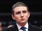 Barron Trump watches as his father, President Donald Trump attends an indoor Presidential Inauguration parade event at Capital One Arena, in Washington, Jan. 20.(AP Photo/Evan Vucci)