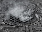 Three people were caught on video climbing out of a Manhattan manhole near Penn Station.(Unsplash)