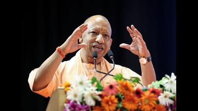 Chief minister Yogi Adityanath delivers a speech after presenting appointment letters to candidates selected for the posts of mandi secretary and technical assistant, at Indira Gandhi Pratishthan, in Lucknow on Tuesday. (ANI Photo)