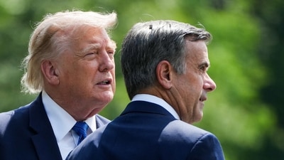 Donald Trump and John Ratcliffe, Director of the Central Intelligence Agency (CIA), speak as they depart after a Cabinet meeting at Camp David in Thurmont, Maryland on July 31. (REUTERS)