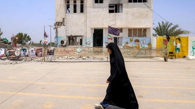 A woman walks past the building of the destroyed Shajareh Tayebeh primary school in Minab in Iran. (AFP (representational image)) A woman walks past the building of the destroyed Shajareh Tayebeh primary school in Minab in Iran. (AFP (representational image))
