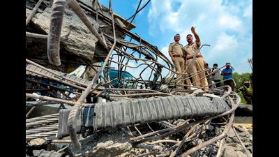 Security officials at the site after a concrete bridge pier collapsed during construction work, in Samba district of Jammu and Kashmir, on Tuesday. (PTI) Security officials at the site after a concrete bridge pier collapsed during construction work, in Samba district of Jammu and Kashmir, on Tuesday. (PTI)