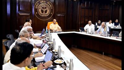 The cabinet, chaired by chief minister Yogi Adityanath in Lucknow on Tuesday. (HT Photo) The cabinet, chaired by chief minister Yogi Adityanath in Lucknow on Tuesday. (HT Photo)