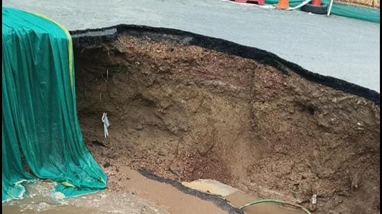 A portion of service road at IFFCO Chowk caved in. (HT Photo)