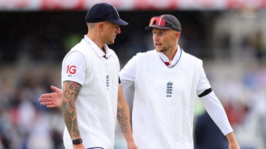 Joe Root and Brydon Carse