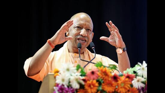 Chief minister Yogi Adityanath delivers a speech after presenting appointment letters to candidates selected for the posts of mandi secretary and technical assistant, at Indira Gandhi Pratishthan, in Lucknow on Tuesday. (ANI Photo)