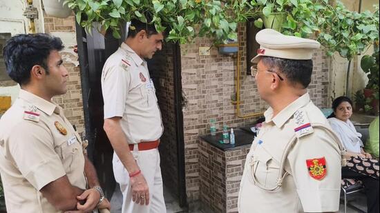 Police at the scene of the crime on Friday. (HT Photo)