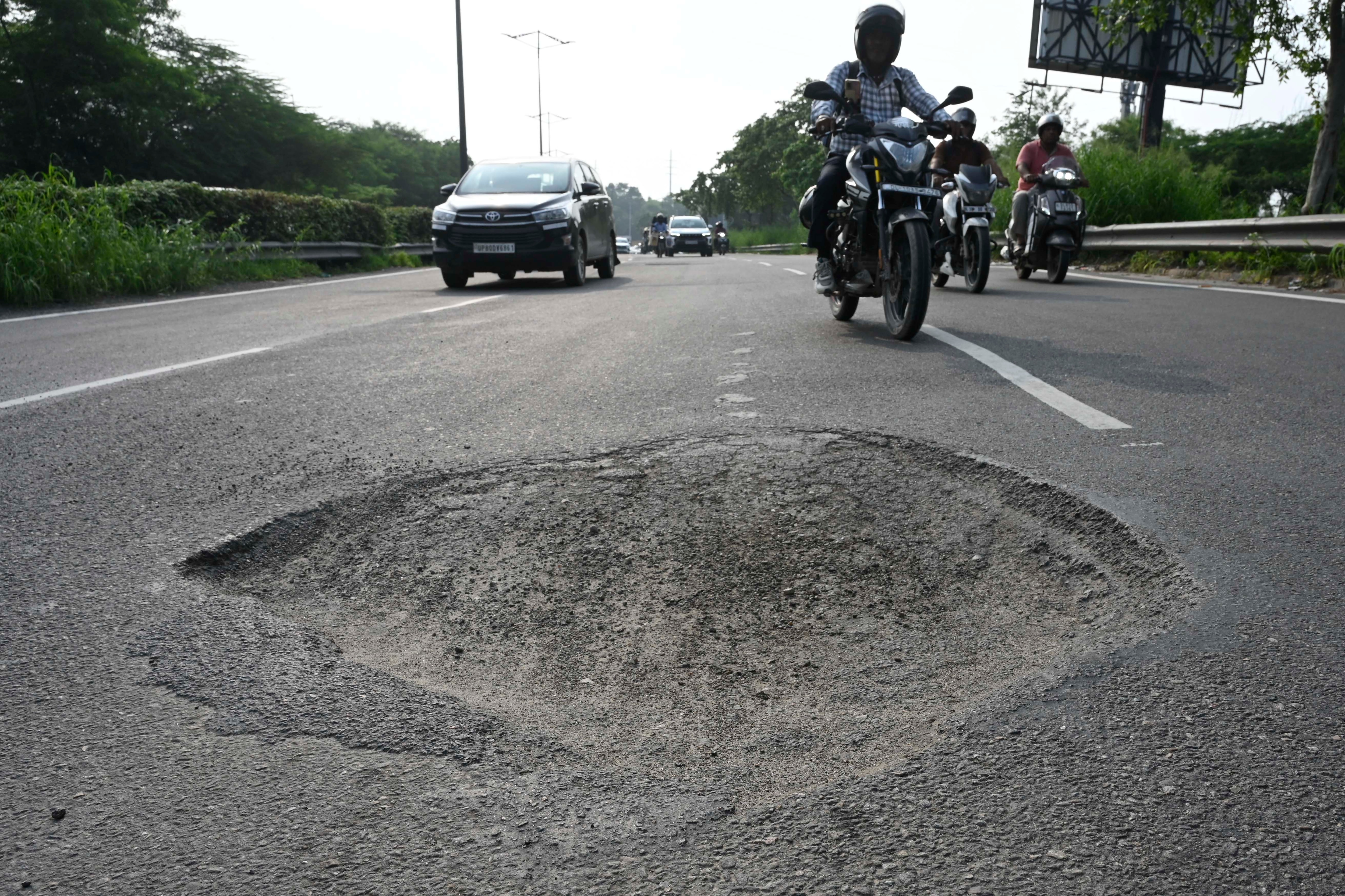 Pothole in ring road at kilokari village near DND, in New Delhi, August 12, 2026. ((Photo by Sanjeev Verma/ Hindustan Times)) Pothole in ring road at kilokari village near DND, in New Delhi, August 12, 2026. ((Photo by Sanjeev Verma/ Hindustan Times))