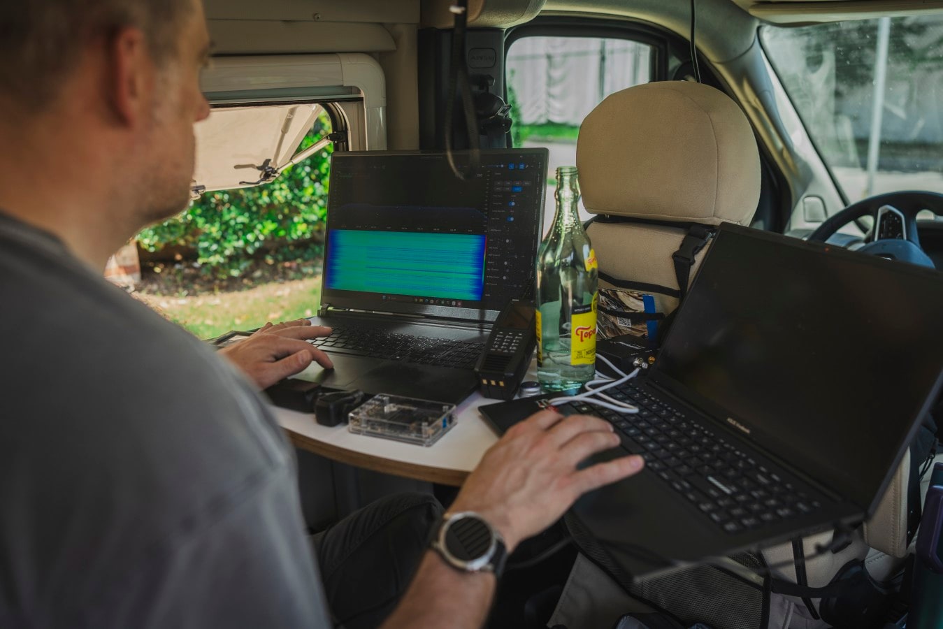 Benn Jordan and Patrick Quirk captured digital information on the Flock Forward 2026 conference from a van.