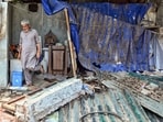 A view of the area as the demolition of the BR Camp slum cluster behind the Race Club is underway, in New Delhi on Sunday.