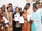 Chief Minister Rekha Gupta with beneficiaries during the inauguration of the portal earlier this month. (Sonu Mehta/HT Photo)