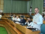 Chief minister Sukhvinder Singh Sukhu addressing the assembly during the Himachal Pradesh Vidhan Sabha monsoon session in Shimla on Tuesday. (HT Photo)