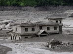 A mud-covered building following a flash flood at Trishuli in Nuwakot district, Nepal, August 26, 2026. 
