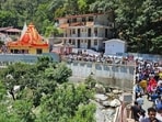 No influencer, temple, or foundation may lay claim to a holy person. If they belong anywhere, it is as much to the hungry man standing outside a hospital as to a devotee praying in front of their photo. (Shutterstock)