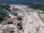 Over 50 Tamil Nadu pilgrims are stranded near the Nepal-China border after flash floods killed at least nine people and damaged roads and infrastructure. (AFP)